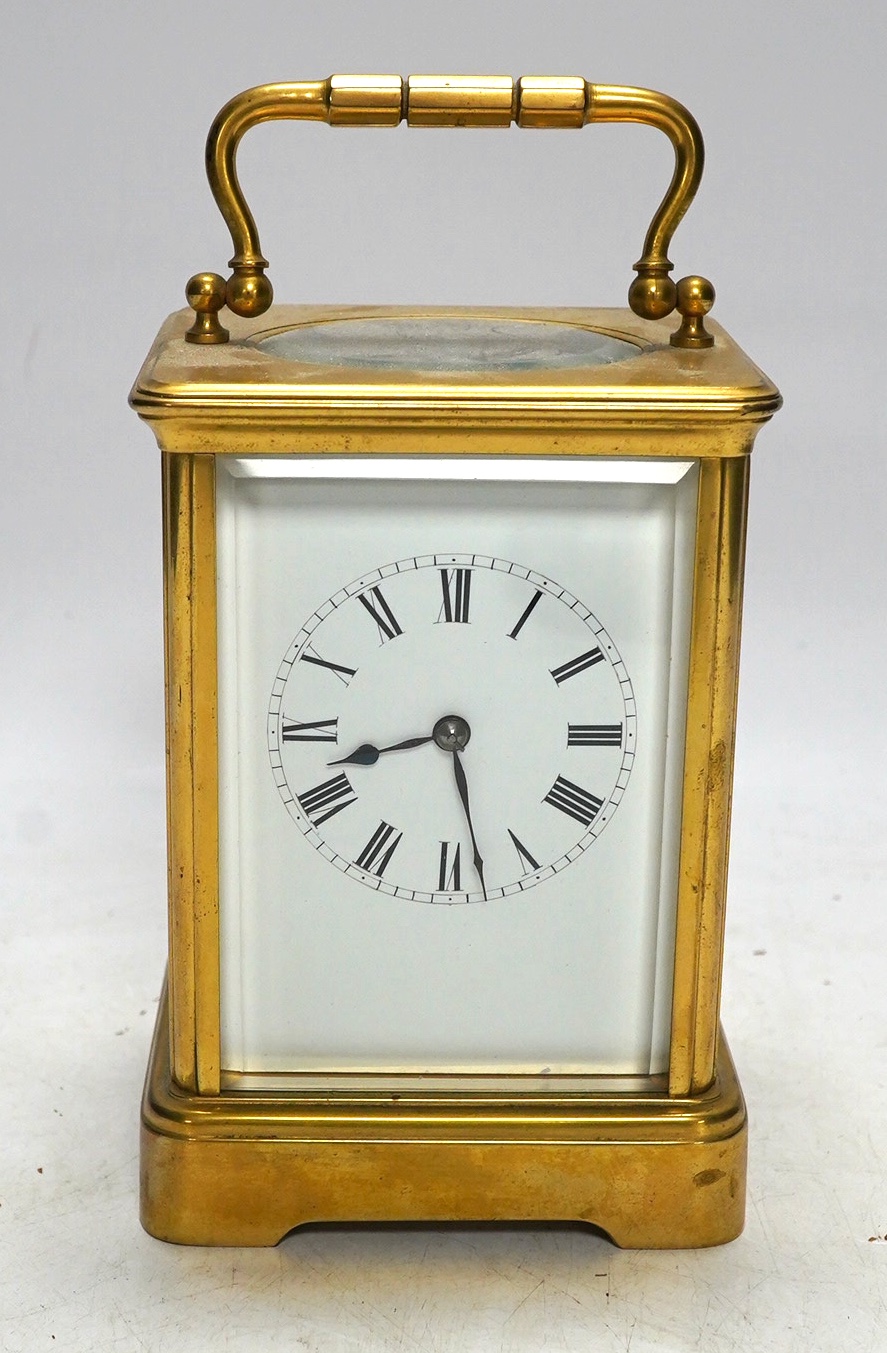 An early 20th century French brass carriage clock by R & Co., Paris. 14.5cm tall. No key. Condition - fair. Not tested as working